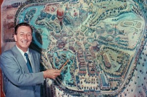 Walt Disney showing off the layout of the park.