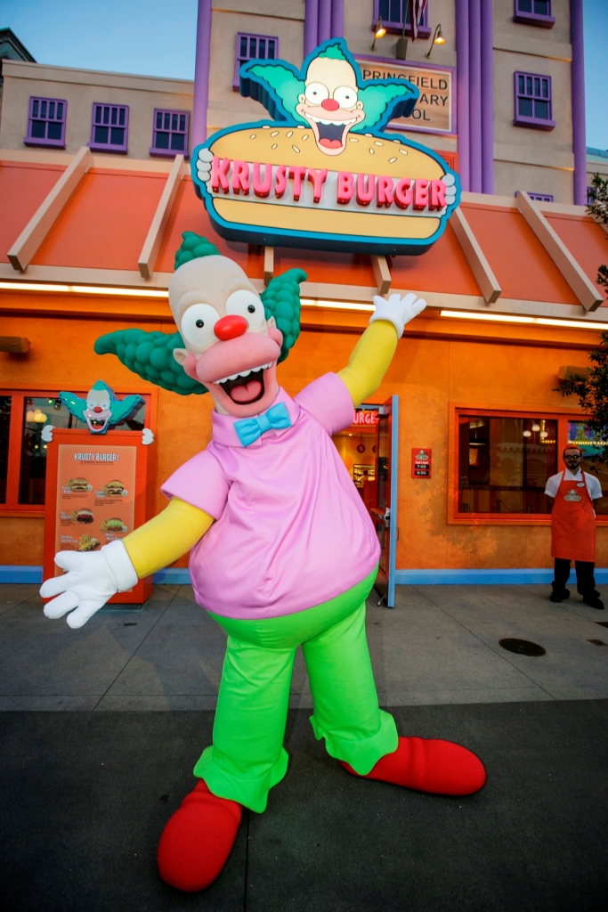 Krusty unveiling the new Krusty Burger!