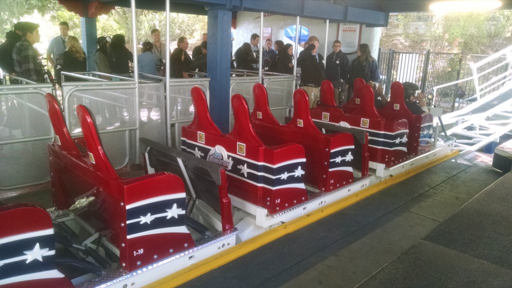 A close up look of the new trains (and restraints). You can see the little "Six Flags" square in front of each seat that the VR headset uses to calibrate itself.